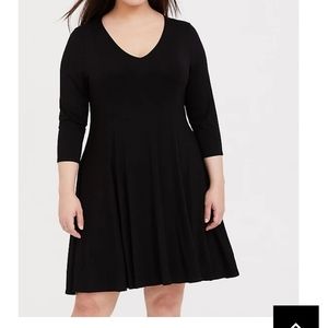 BLACK JERSEY TRAPEZE DRESS from TORRID